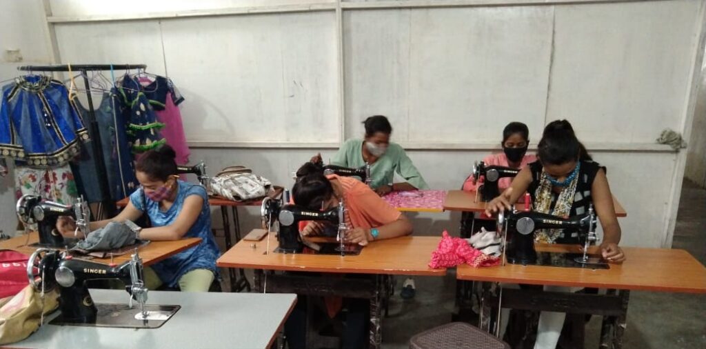 Women are learning stitching skill in Lalit Kala