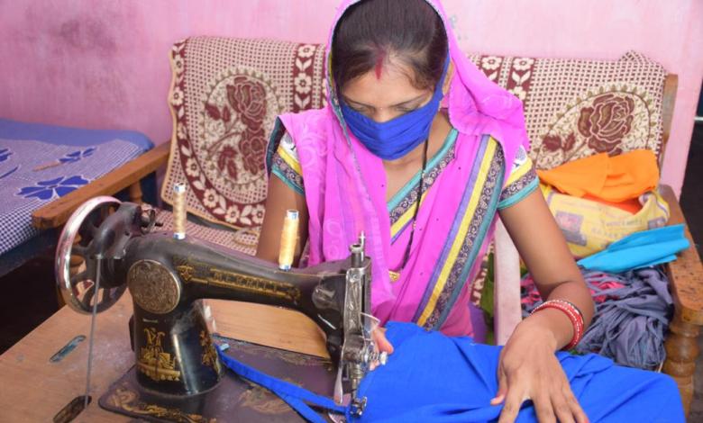 Woman stitching clothes 