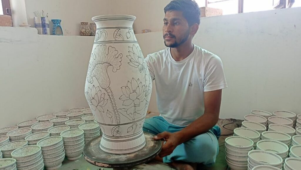 A craftsman making pot