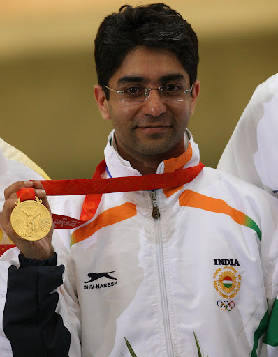 Gold winner Abhinav Bindra of India holds his medal 