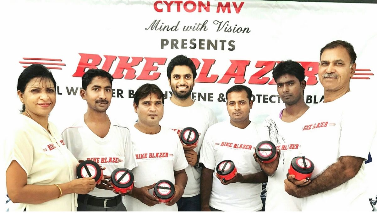 Entrepreneur Keshav Rai with his Team and Bike Blazer in Hand 