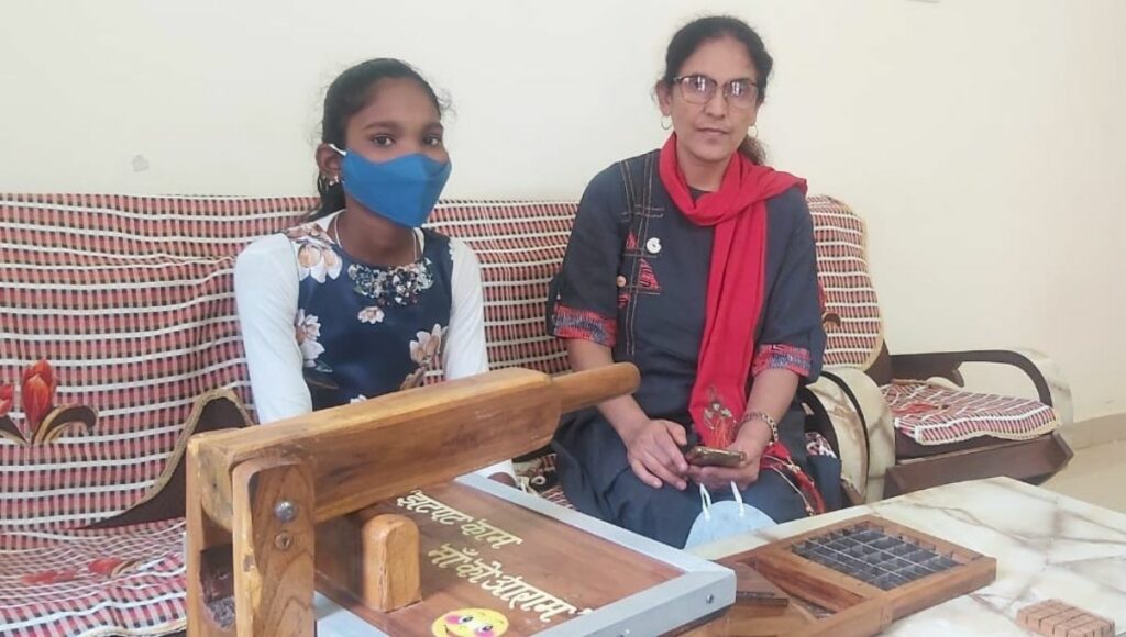 Young innovator Navshri Thakur with her teacher 