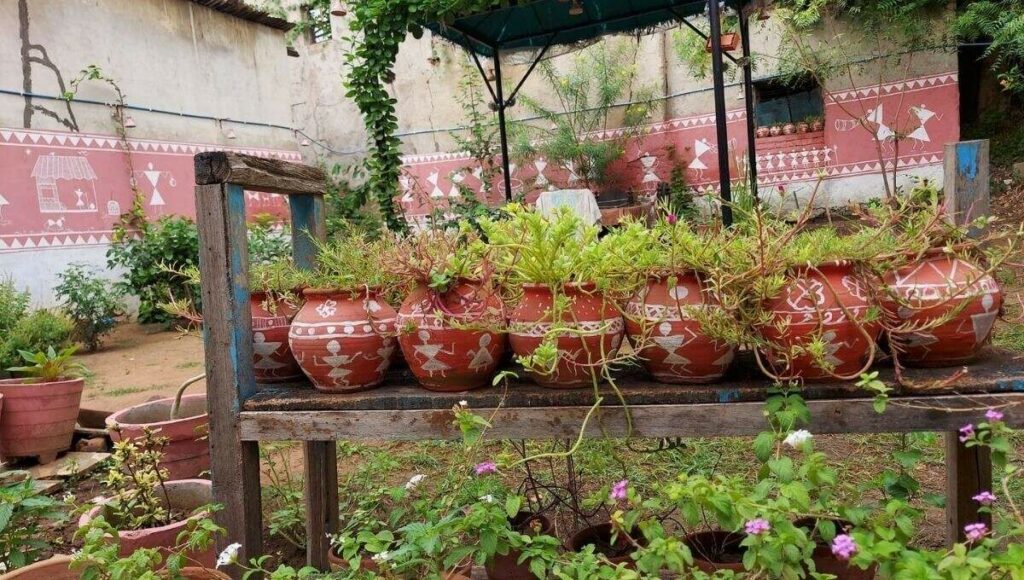 gardening at home with colorful pots 