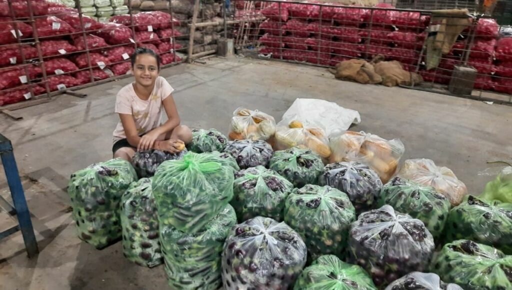 Ravi Bishnoi's daughter with the farm produce
