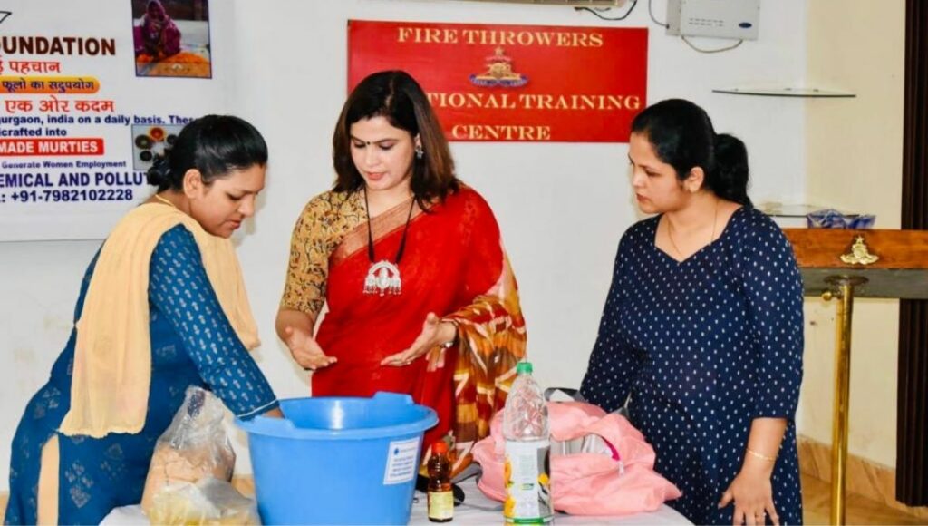Poonam giving training to women to make goods from flowers