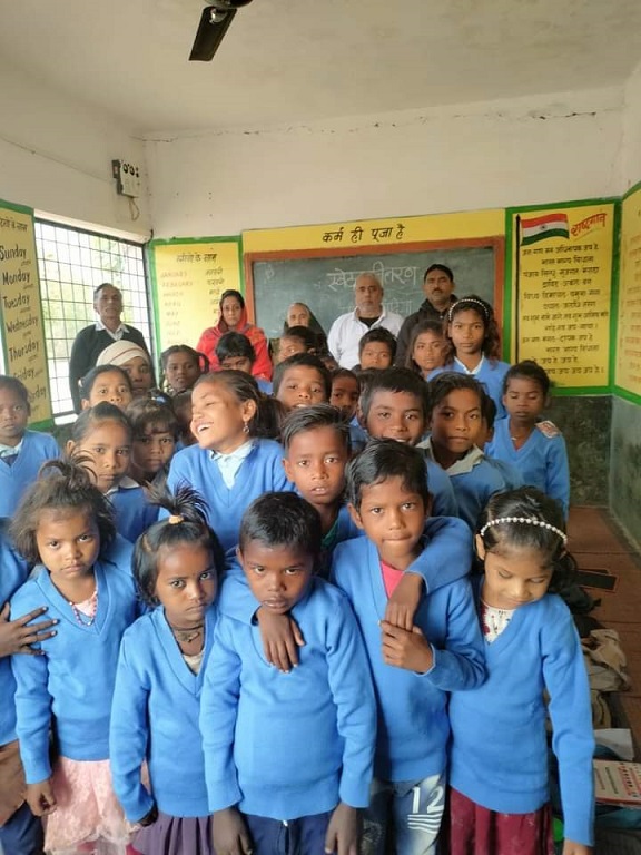 Retired teacher Vijay with his school kids