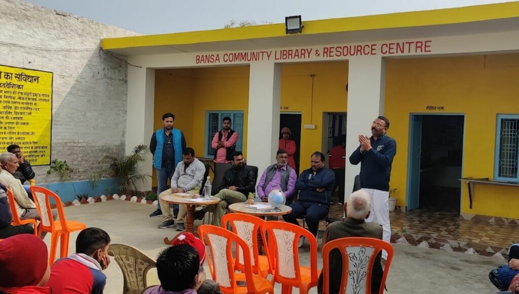 Jatin's friends making children and villagers aware of the library