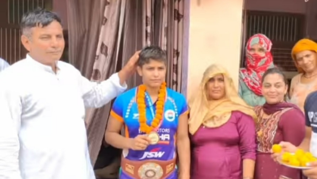 Antim with her family after winning World under 20 wrestling championship
