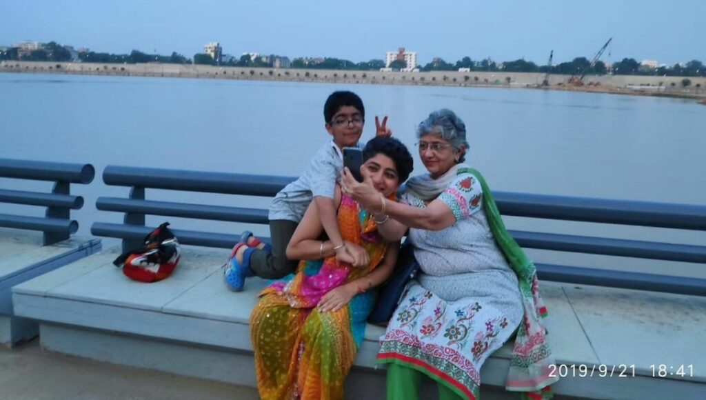 Veena ji with her daughter, Shefali and grandson.
