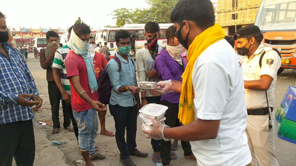 Ravi Shankar, while distributing food to the migrant workers at Chhapra Railway station 