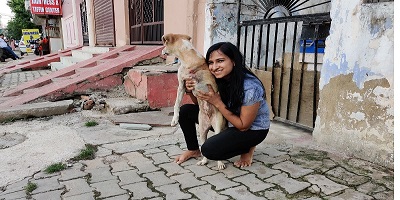 Sonal Gupta with a street dog