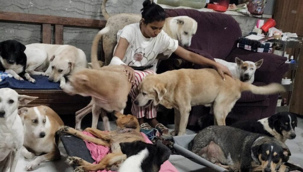 Harsimaran with Her Dogs 
